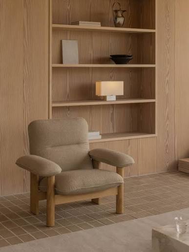 Audo Copenhagen Brasilia Lounge Chair Natural Oak Moss in a stylish modern living room setting.